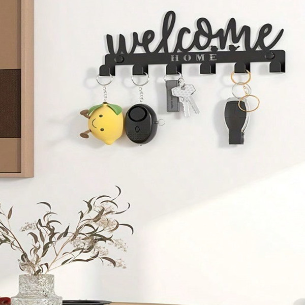 This one - piece adhesive - mounted key holder doubles as an all - in - one organizer. It can hold keys, hats, and towels, offering a sleek and practical solution for wall - mounted storage.-4