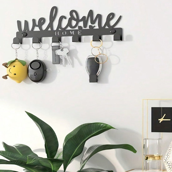 This one - piece adhesive - mounted key holder doubles as an all - in - one organizer. It can hold keys, hats, and towels, offering a sleek and practical solution for wall - mounted storage.-2
