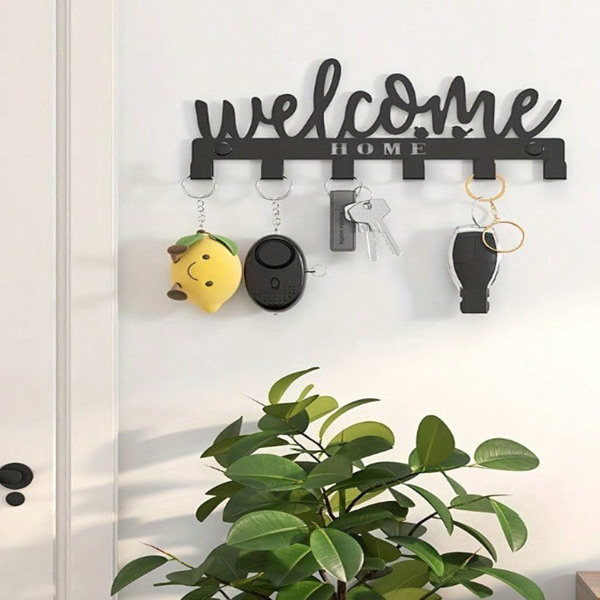 This one - piece adhesive - mounted key holder doubles as an all - in - one organizer. It can hold keys, hats, and towels, offering a sleek and practical solution for wall - mounted storage.-3