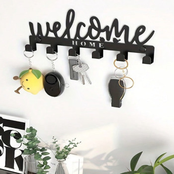 This one - piece adhesive - mounted key holder doubles as an all - in - one organizer. It can hold keys, hats, and towels, offering a sleek and practical solution for wall - mounted storage.